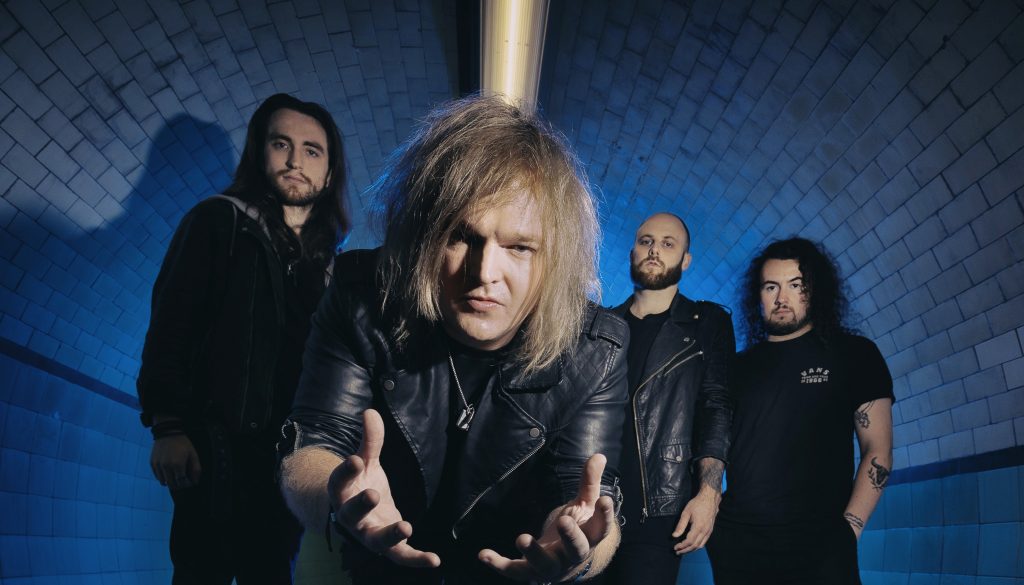 rock star holding out his hands